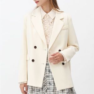 Double breasted blazer in cream